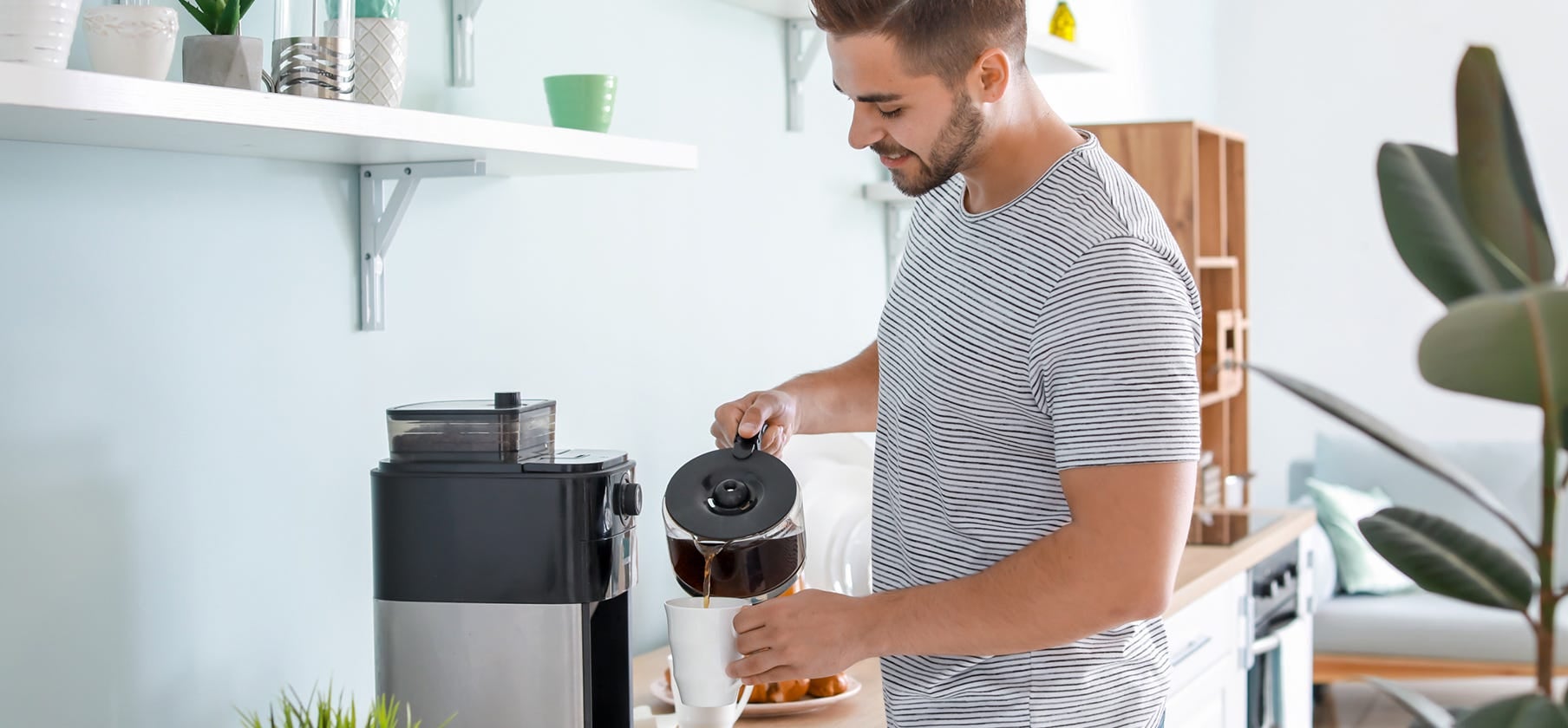 Morning scene of men serving coffee enriched with collagen, promoting wellness and vitality